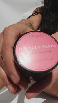 Hibiscus Sands body butter opened and scooped, then massaged into skin until it absorbs to a soft glow.